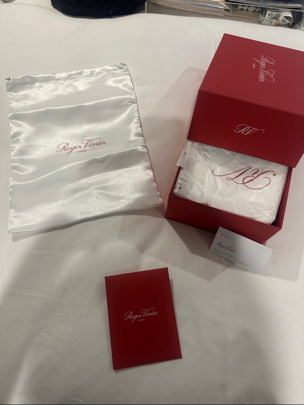 ROGER VIVIER SHOEBOX WITH LOTS OF TISSUE DUST BAG AND THREE MORE THINGS